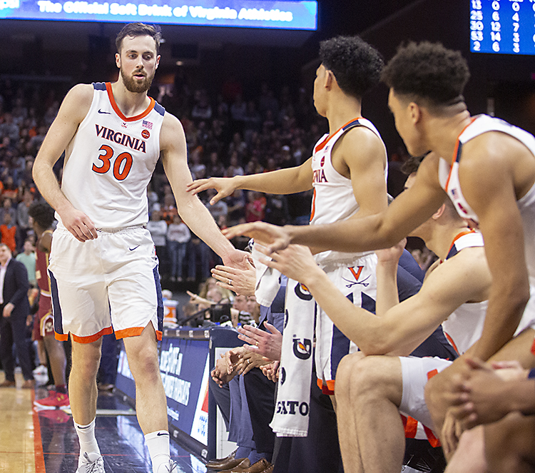 December 29, 2019: Virginia Cavaliers forward Jay Huff (30) goes up for a  dunk to close out NCAA basketball action between the Navy Midshipmen and  the Virginia Cavaliers at John Paul Jones